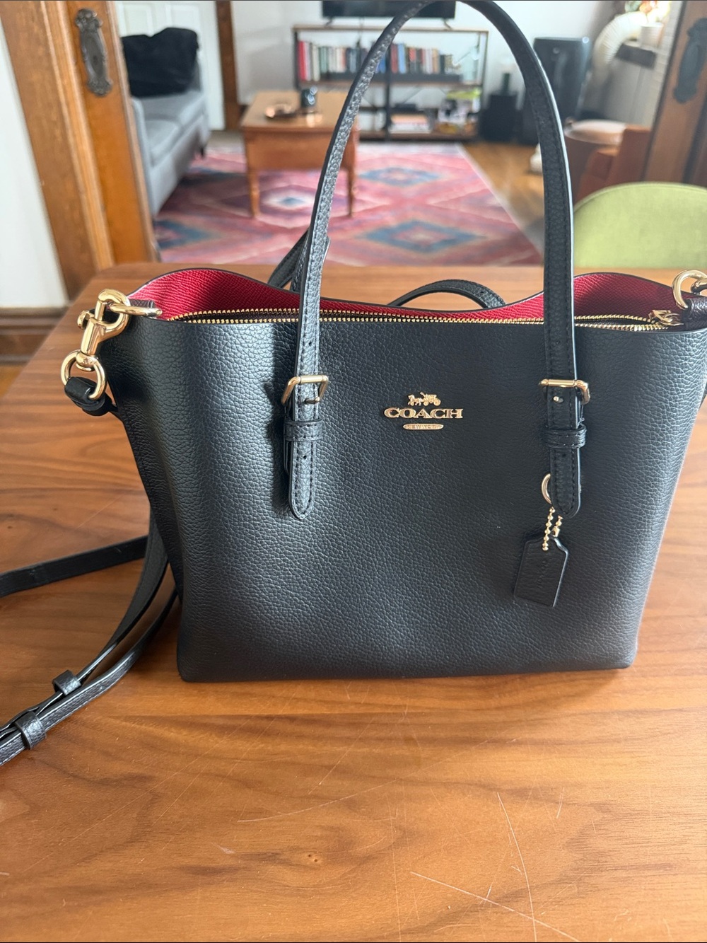 Coach Black Leather Shoulder Bag with Red Interior and Gold Hardware